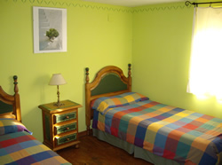 View of green bedroom